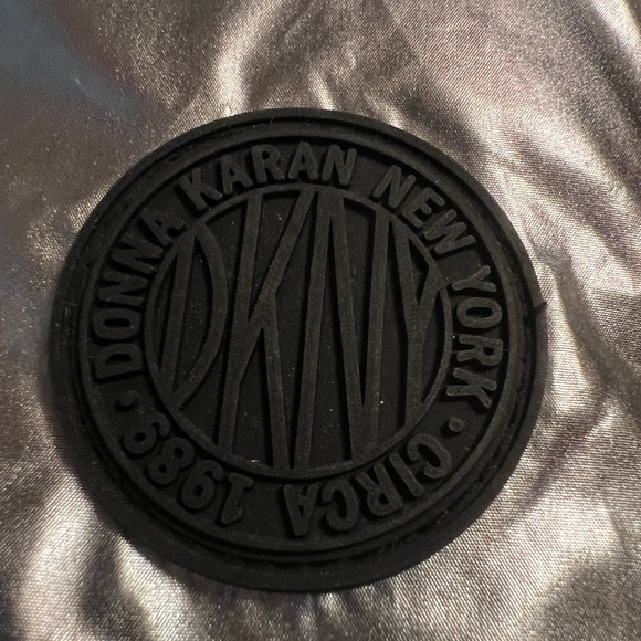 NWOT DKNY quilted silver puffer scarf. Black trim. 8 x 60”. Purchased w/o tags. - Picture 5 of 6